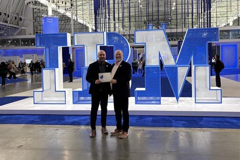 Members of the TD SYNNEX team accept IBM's 2026 Distribution Growth Leader award at the 2026 IBM Partner Plus event.